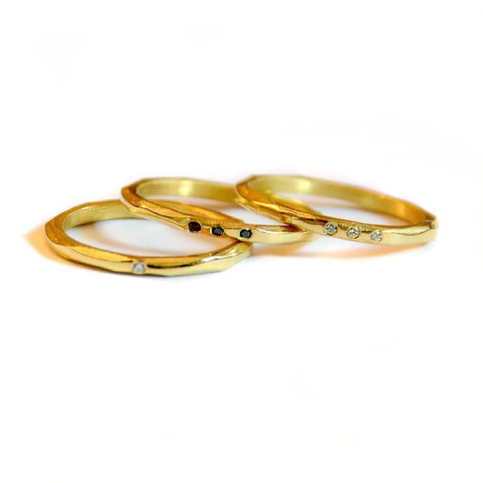 Faceted ring with stones